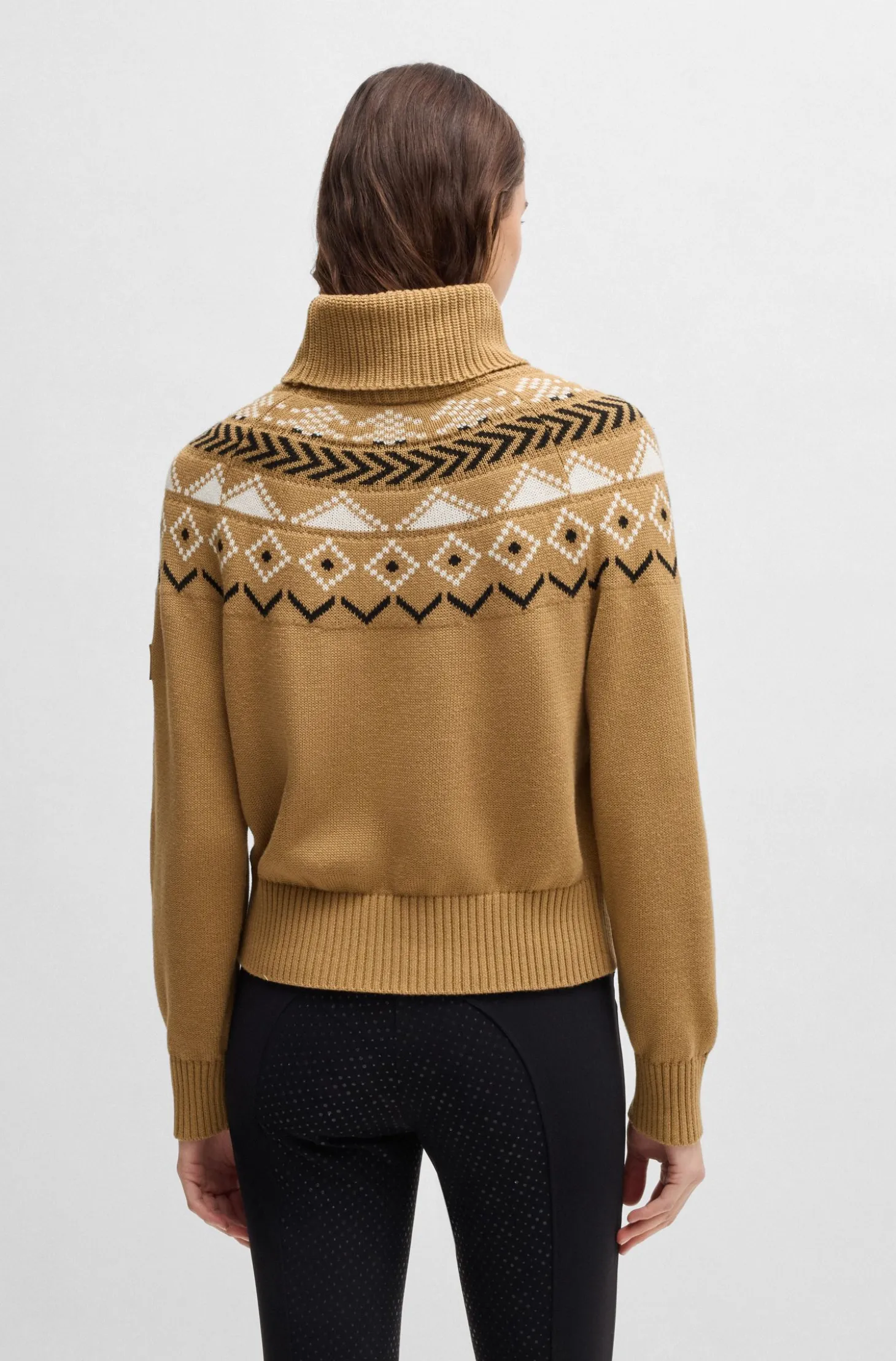 Equestrian rollneck sweater with knitted pattern