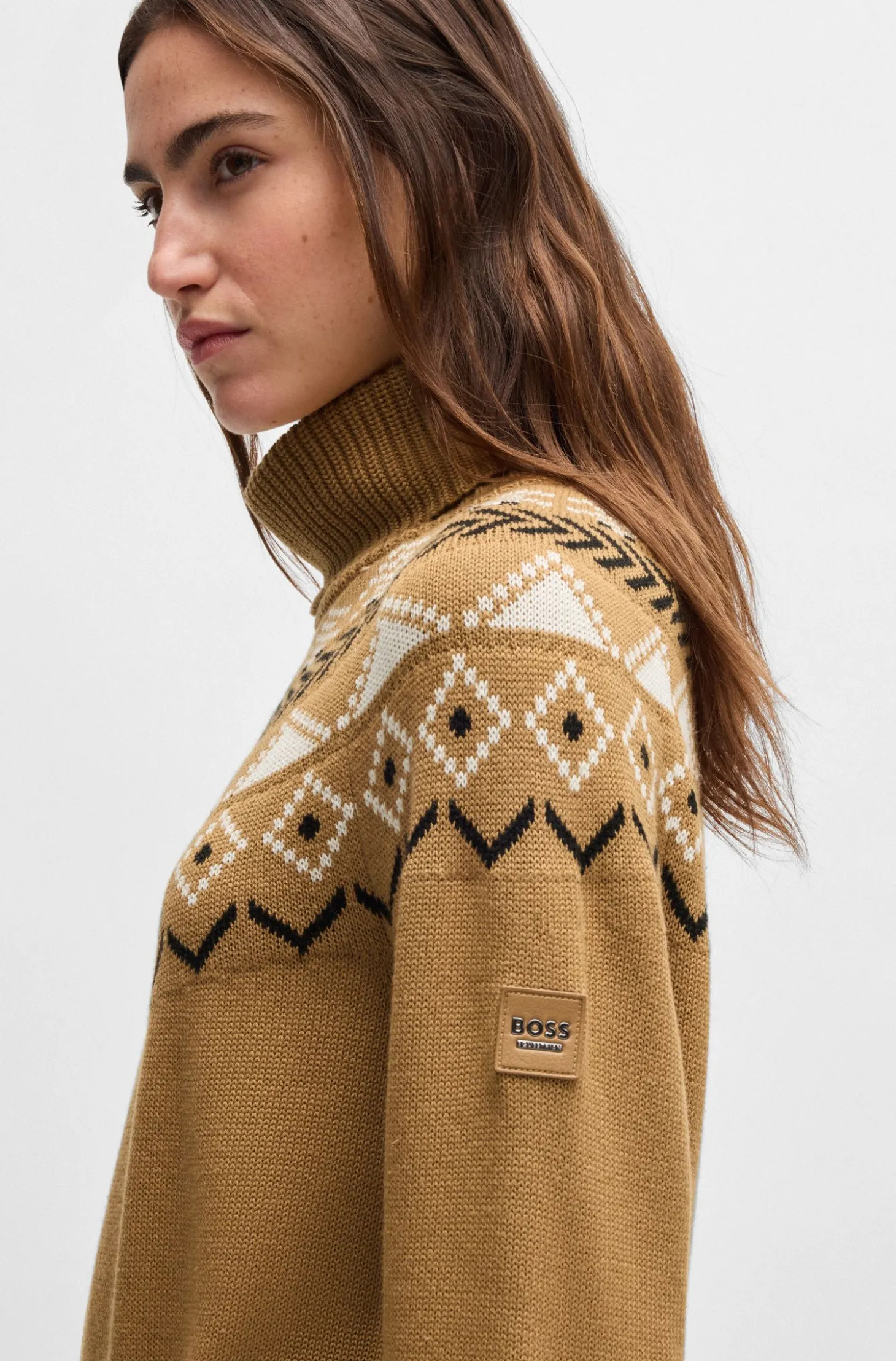 Equestrian rollneck sweater with knitted pattern