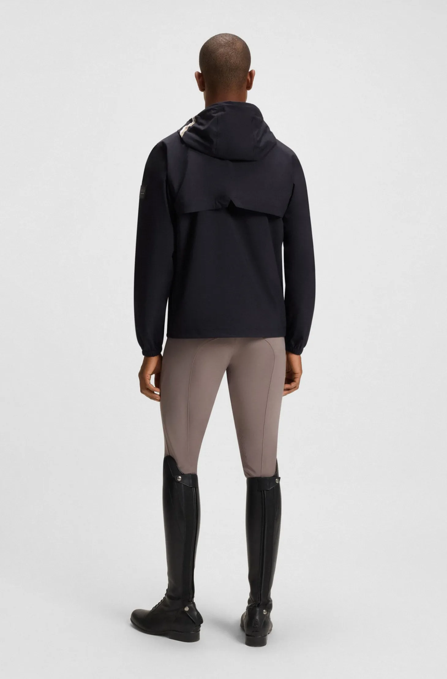 Equestrian waterproof jacket with adjustable hood