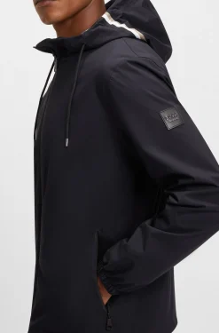 Equestrian waterproof jacket with adjustable hood