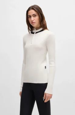 Equestrian zip-neck sweater with ribbed structure