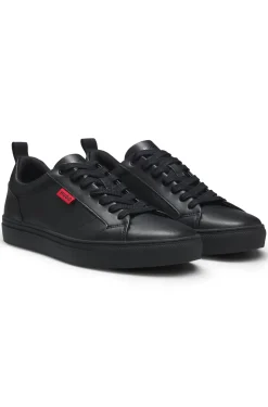 Faux-leather trainers with red logo flag