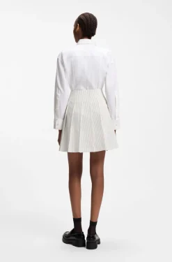 Faux-wrap mini skirt with pinstripe
