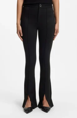 Flared-fit trousers with front slits