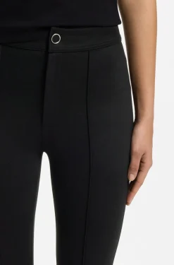 Flared-fit trousers with front slits