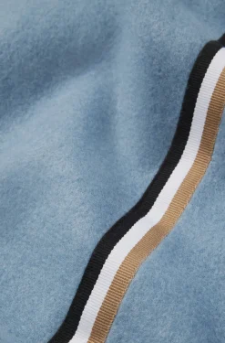 Fleece throw with signature-stripe ribbon