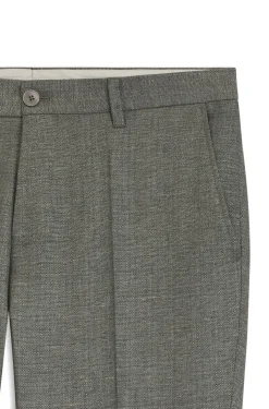 Formal trousers in micro-patterned stretch fabric