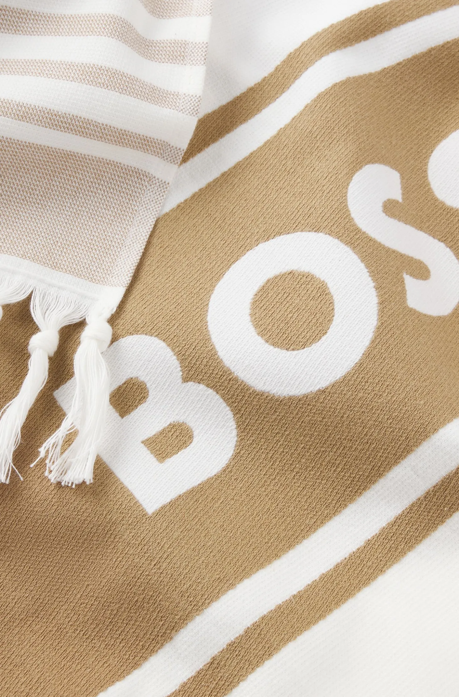 Fringed logo beach towel in cotton jacquard