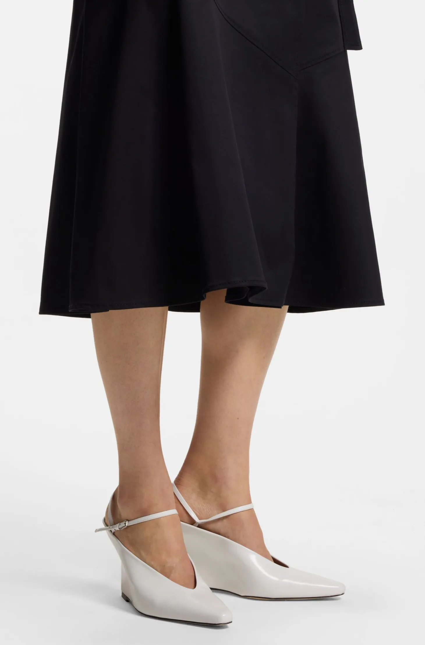 Glossy leather mules with wedge heel and strap