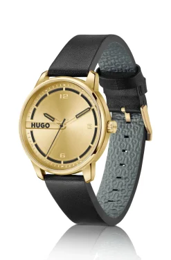 Gold-tone watch with black leather strap