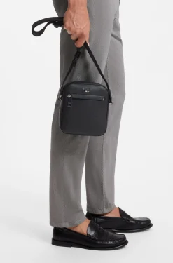 Grained faux-leather reporter bag with signature-stripe trim