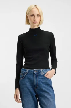 High-neck stretch-cotton top with logo badge