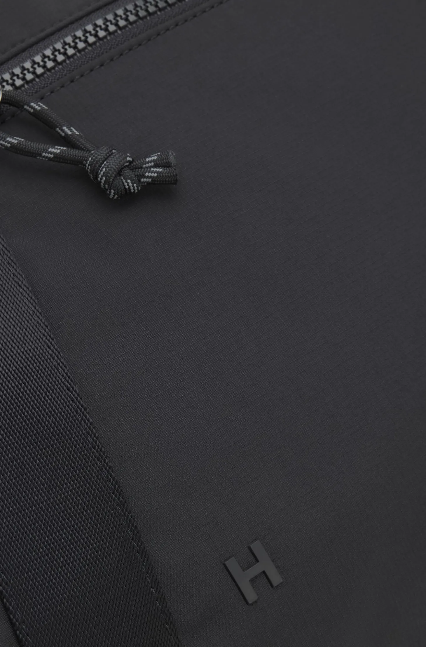 Holdall with wide-set logo detail
