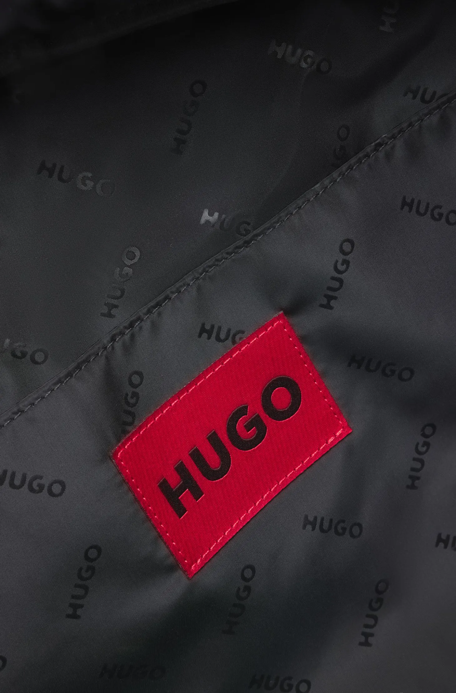 Holdall with wide-set logo detail
