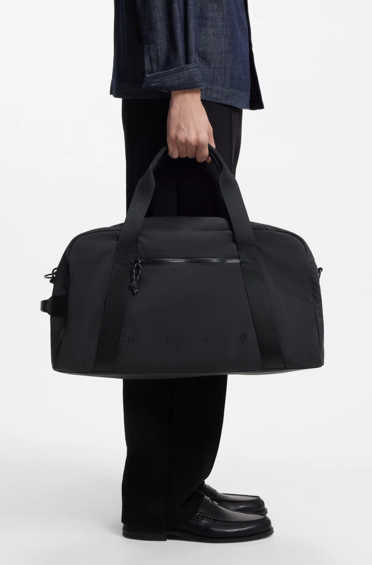 Holdall with wide-set logo detail