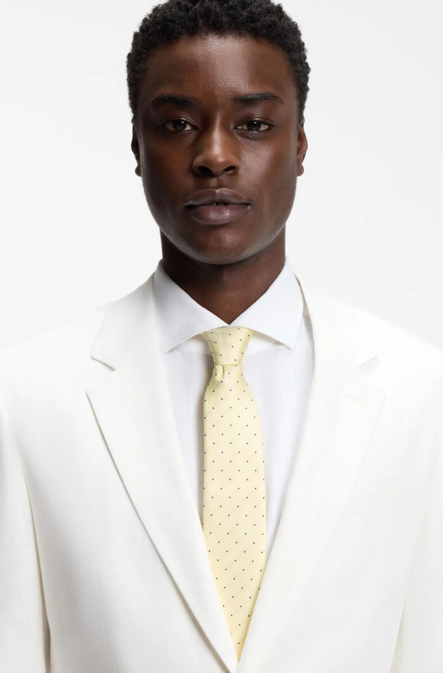 Italian-made tie in silk with jacquard-woven dots