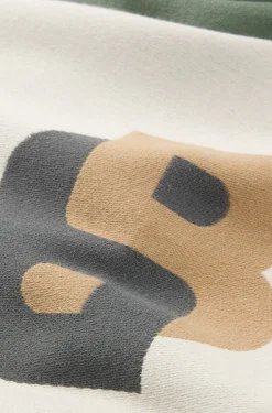 Jacquard cushion cover with whipstitching