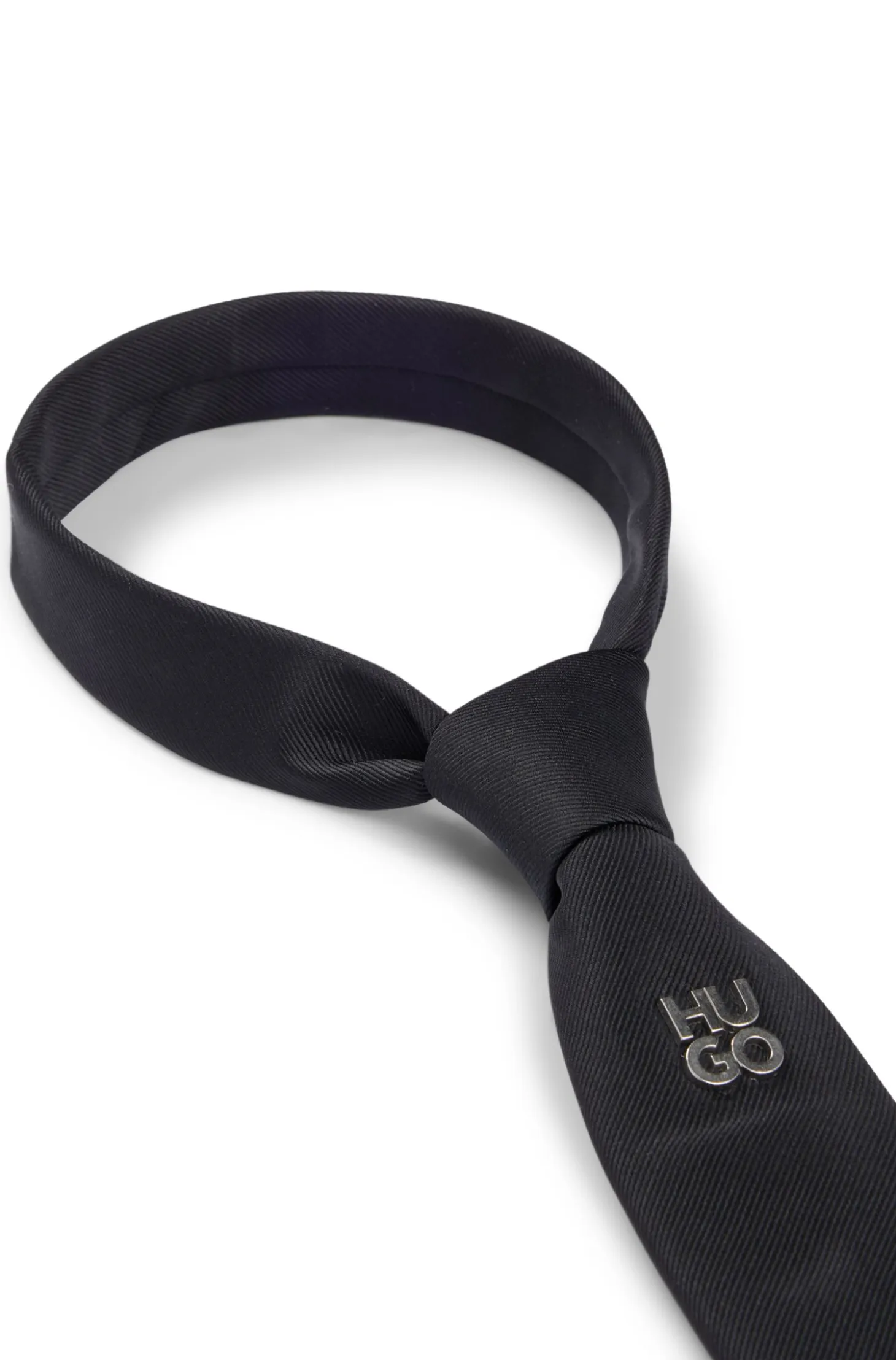Jacquard-woven tie with metallic stacked-logo trim
