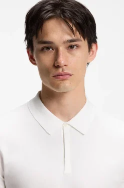 Knit polo with covered placket