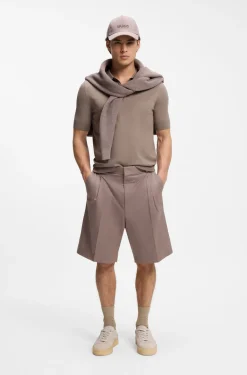 Knit polo with covered placket