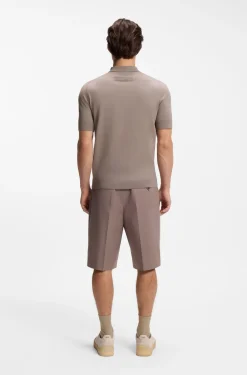Knit polo with covered placket