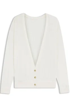 Knitted cardigan with rear button closure