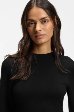 Knitted dress with shaped hemline