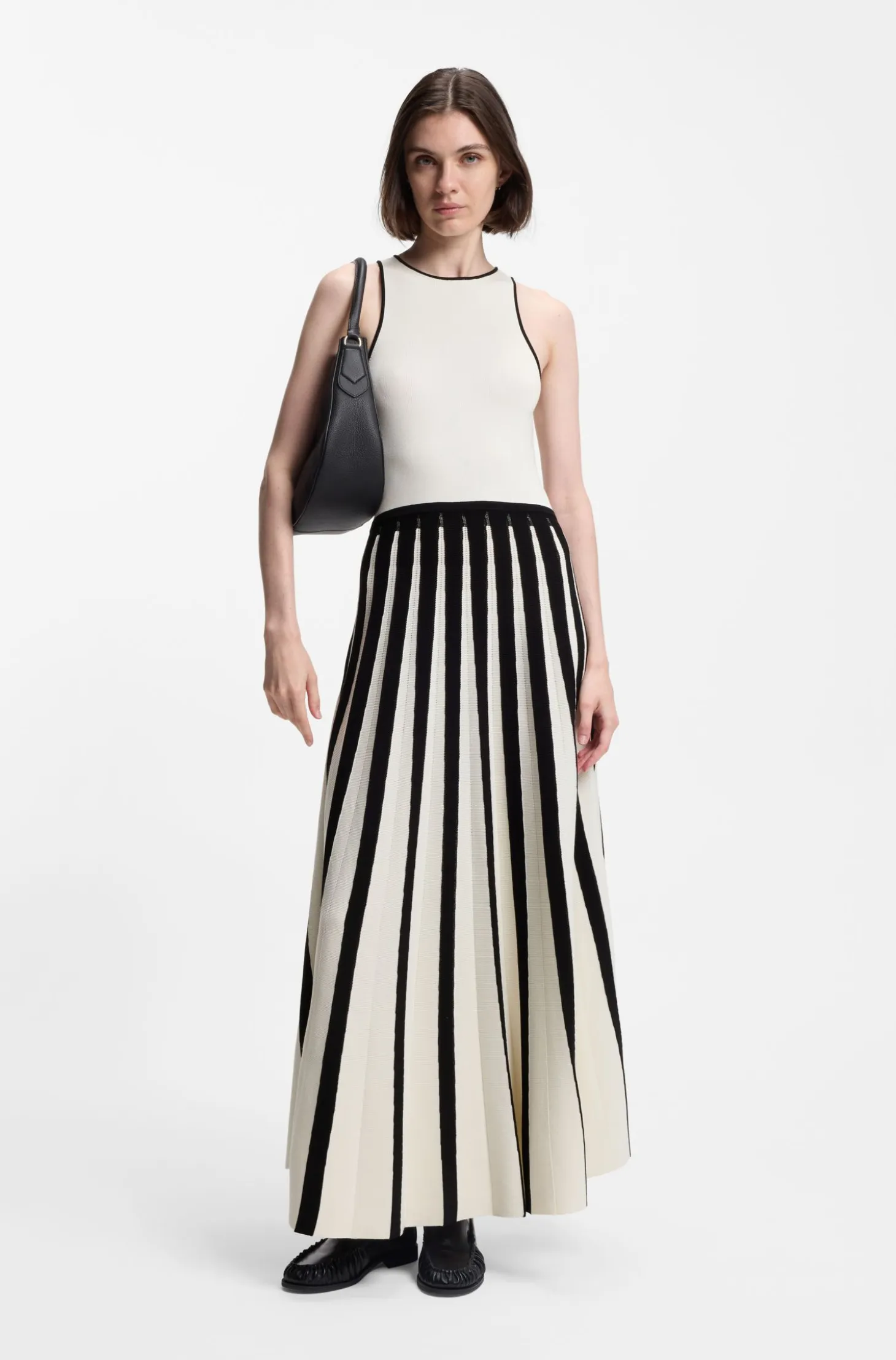 Knitted dress with two-tone pleated skirt