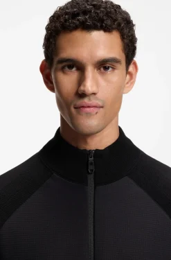 Knitted hybrid jacket with waffle fabric