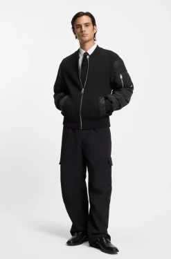 Knitted jacket with contrast sleeves
