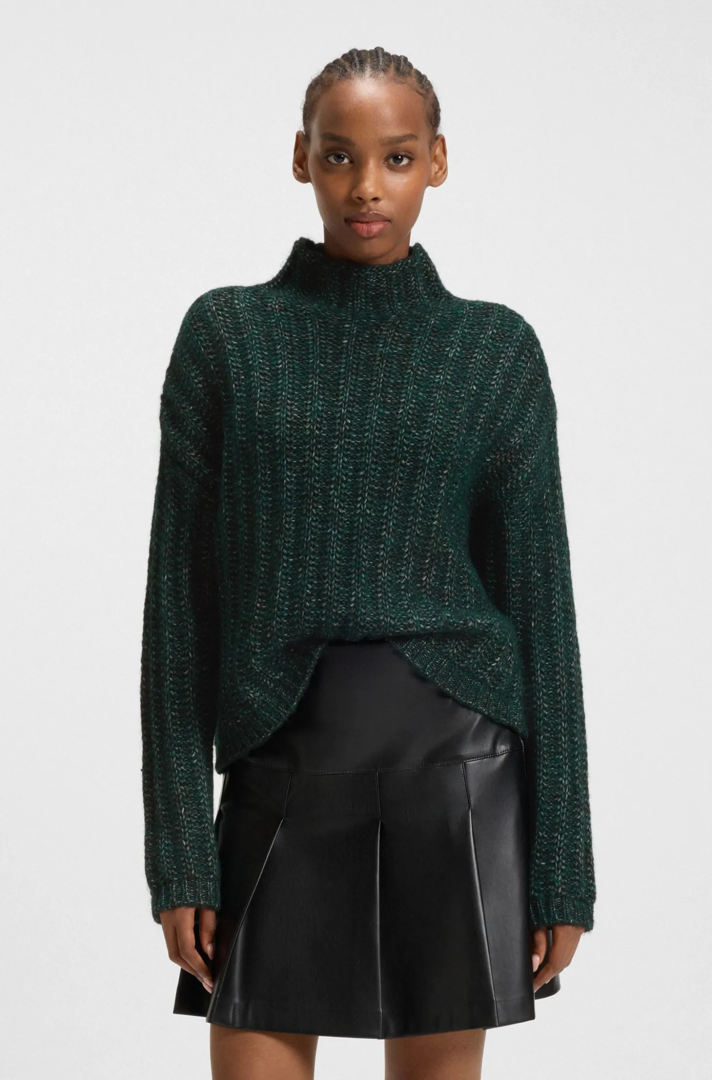 Knitted sweater with ribbed structure