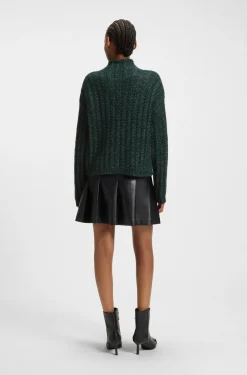 Knitted sweater with ribbed structure