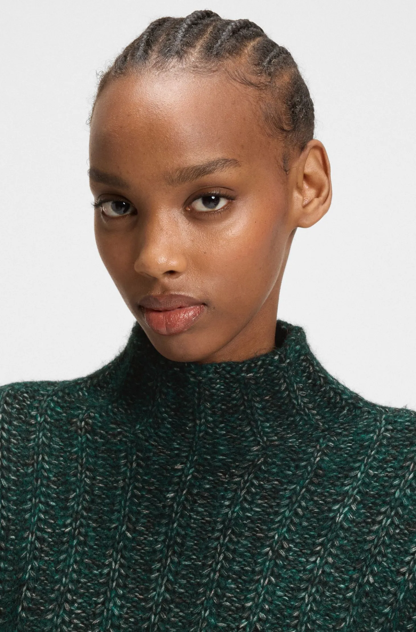 Knitted sweater with ribbed structure