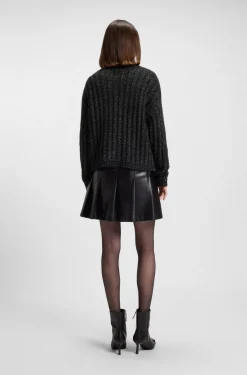 Knitted sweater with ribbed structure