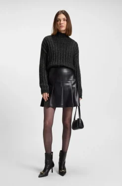 Knitted sweater with ribbed structure