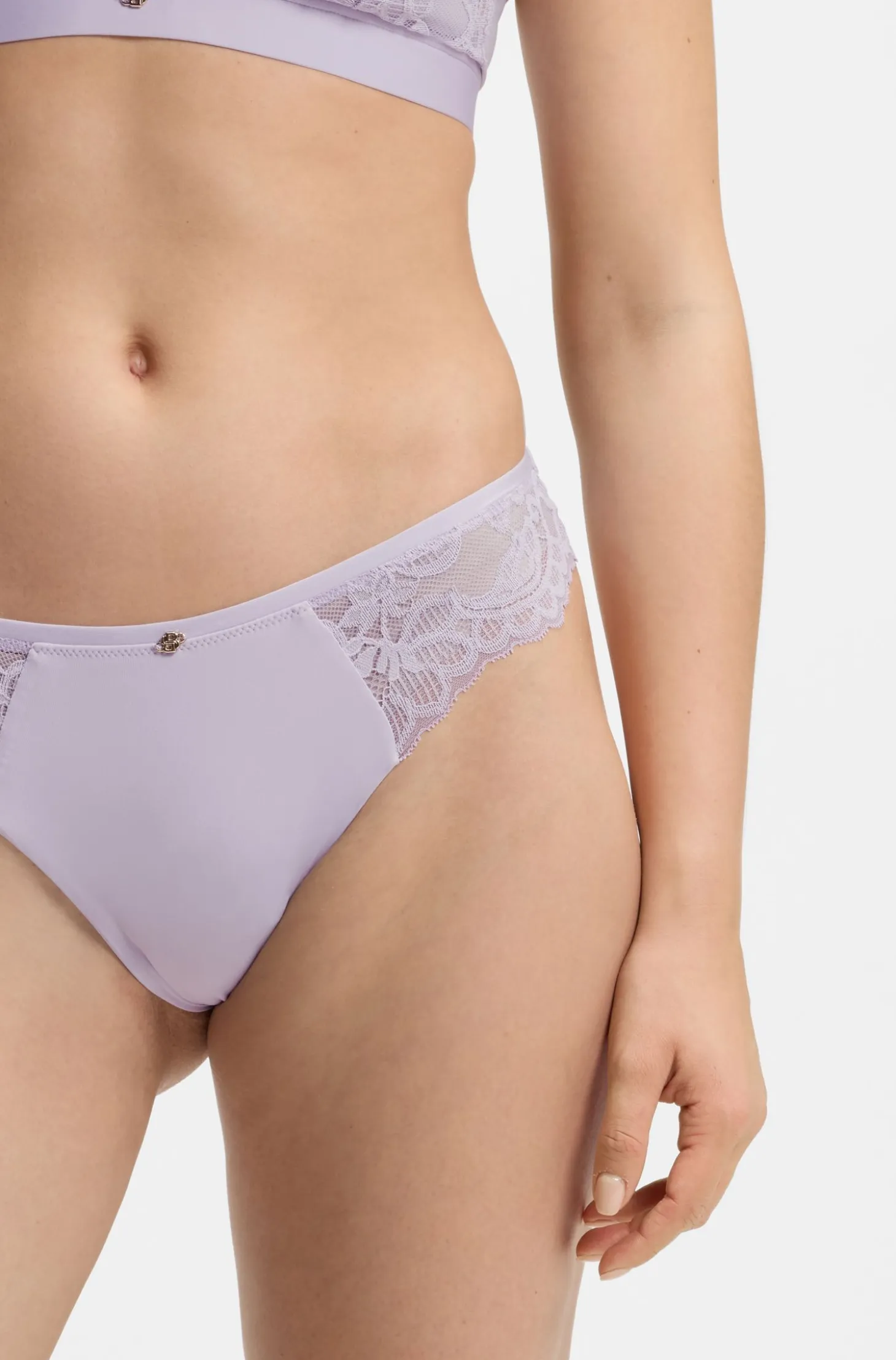 Lace briefs with mesh pleating and gold charm