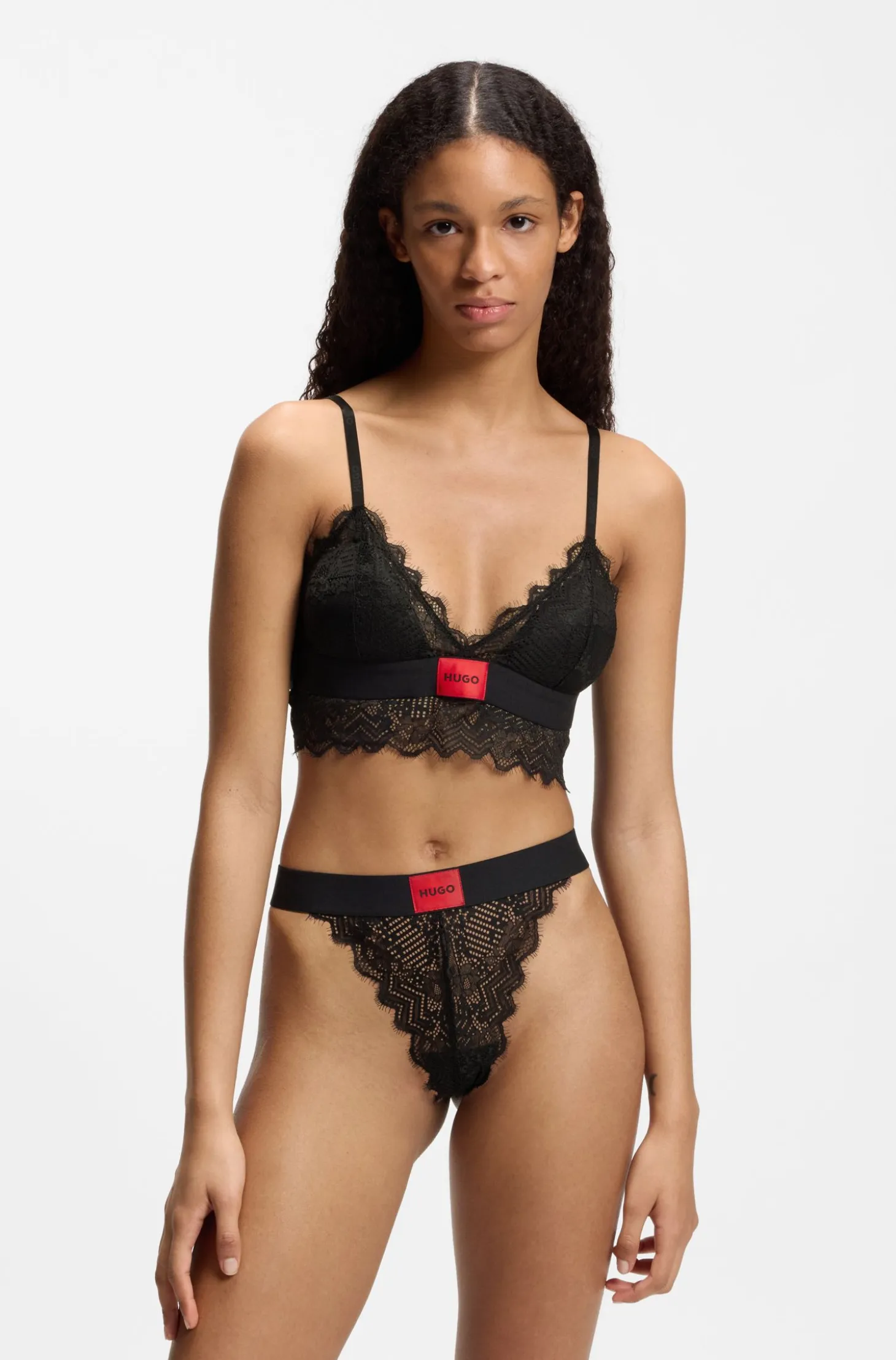 Lace thong with red logo label