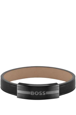 Leather cuff with enamel-filled logo plate