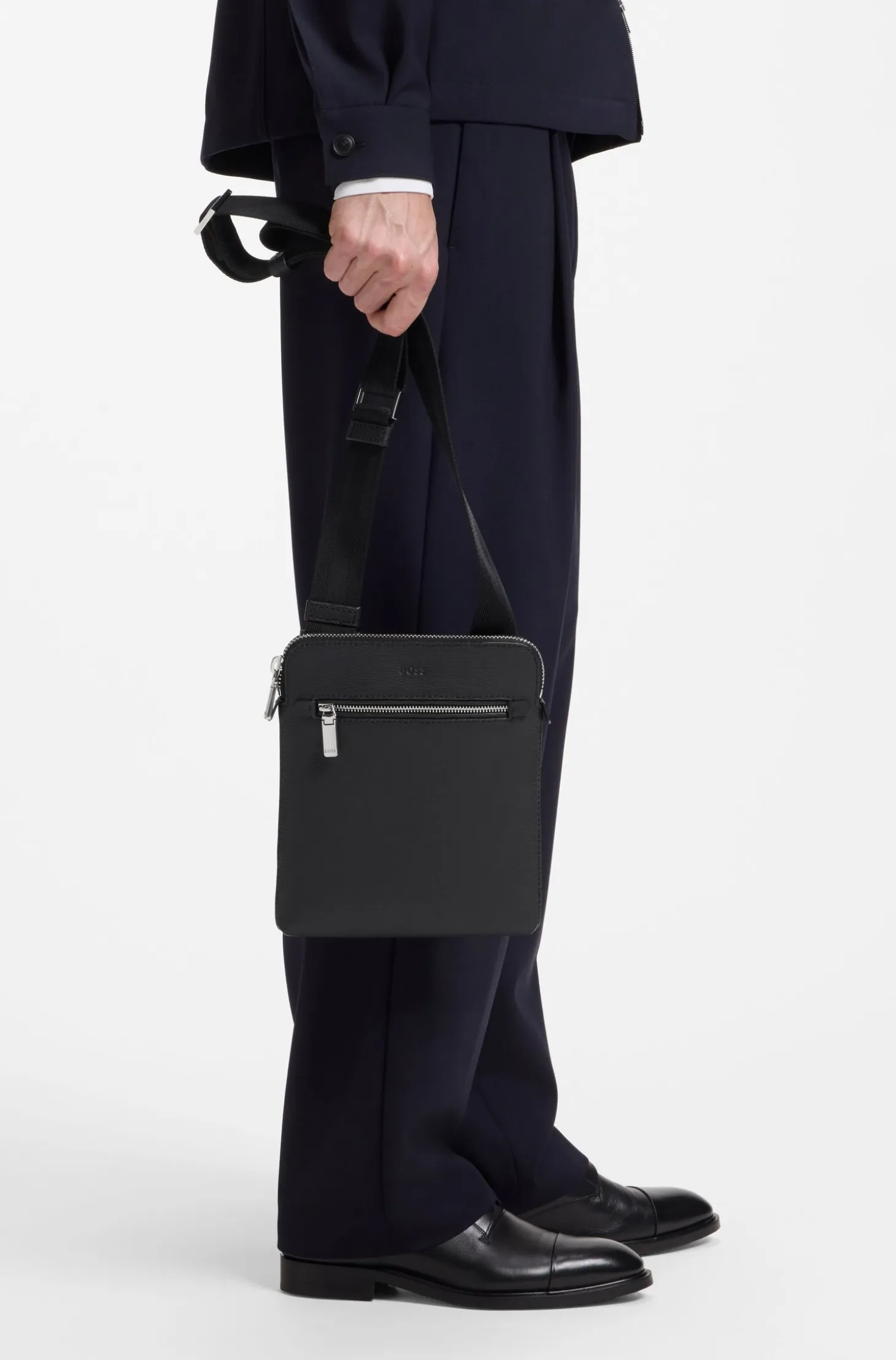 Leather envelope bag with embossed logo