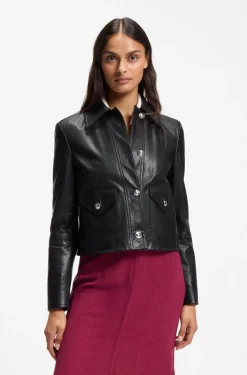 Leather jacket with polished logo buttons