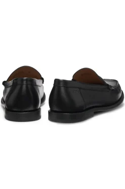 Leather moccasins with penny trim
