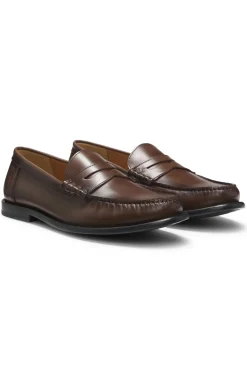 Leather moccasins with penny trim