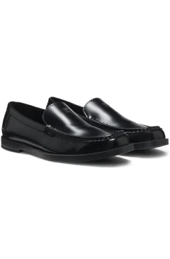 Leather moccasins with stacked logo