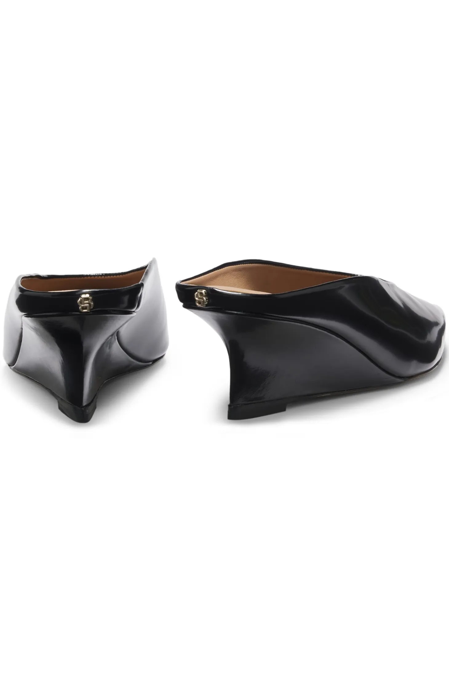 Leather mules with wedge heel