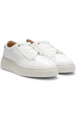 Leather trainers with inner wedge