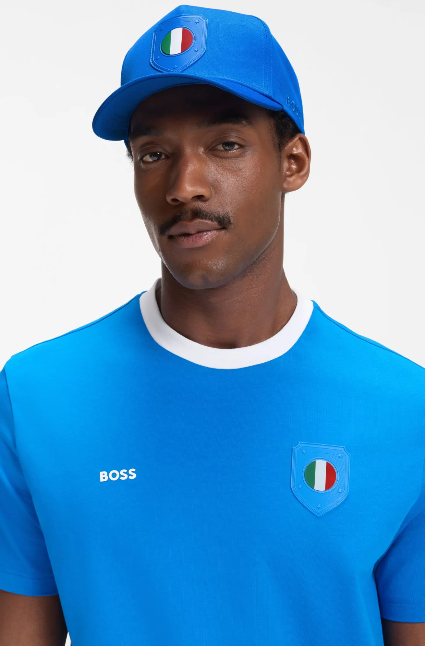 Logo cap in lustrous twill with country-flag badge
