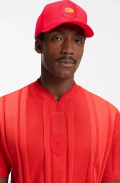 Logo cap in lustrous twill with country-flag badge