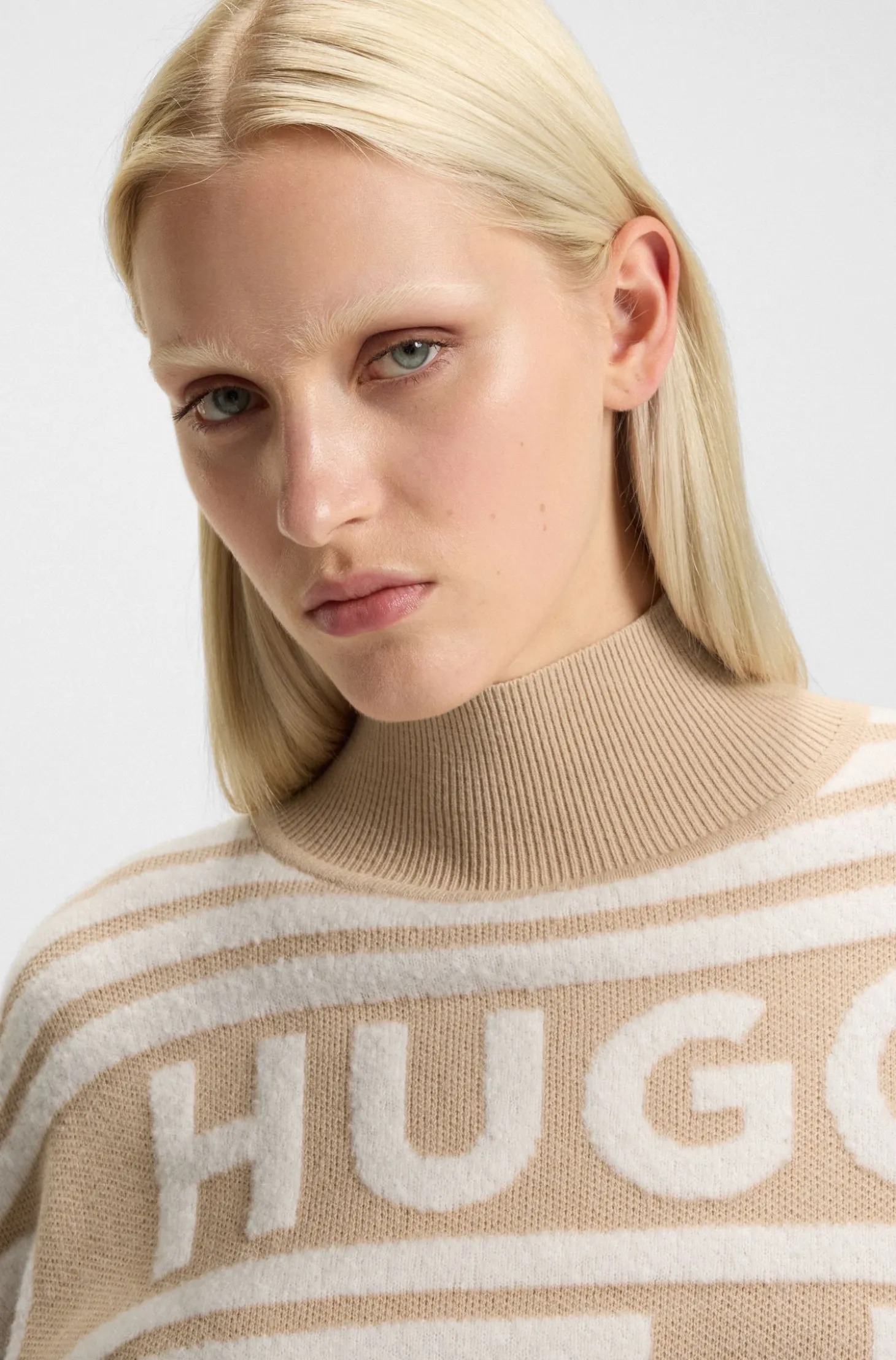 Logo-jacquard oversized-fit sweater with mock neckline
