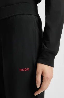 Logo-print tracksuit bottoms in stretch modal and cotton