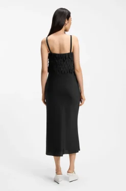 Long-length strappy dress with laser-cut details